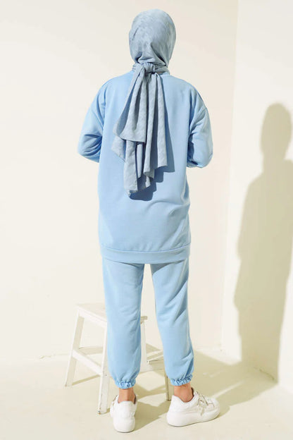 Set a due pezzi con base con dettaglio emblema- azzurro chiaro